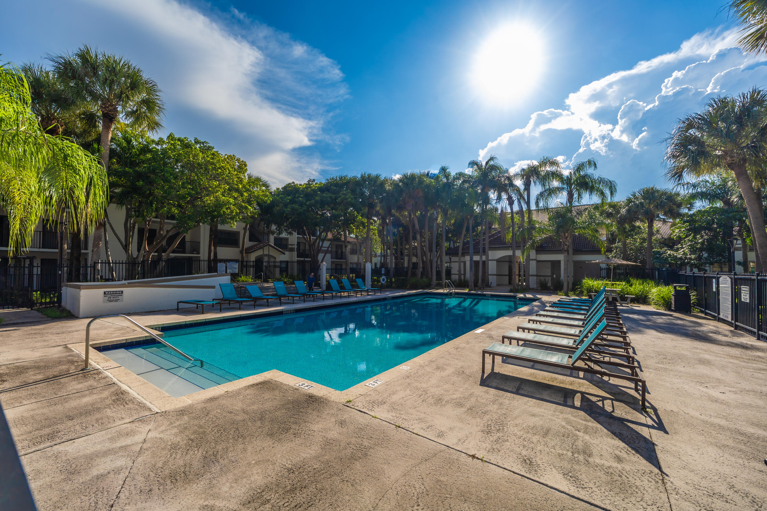 550 South Park Road, Unit 318 Hollywood, FL 33021 - Photo 24 of 27 a view of outdoor space with swimming pool and furniture