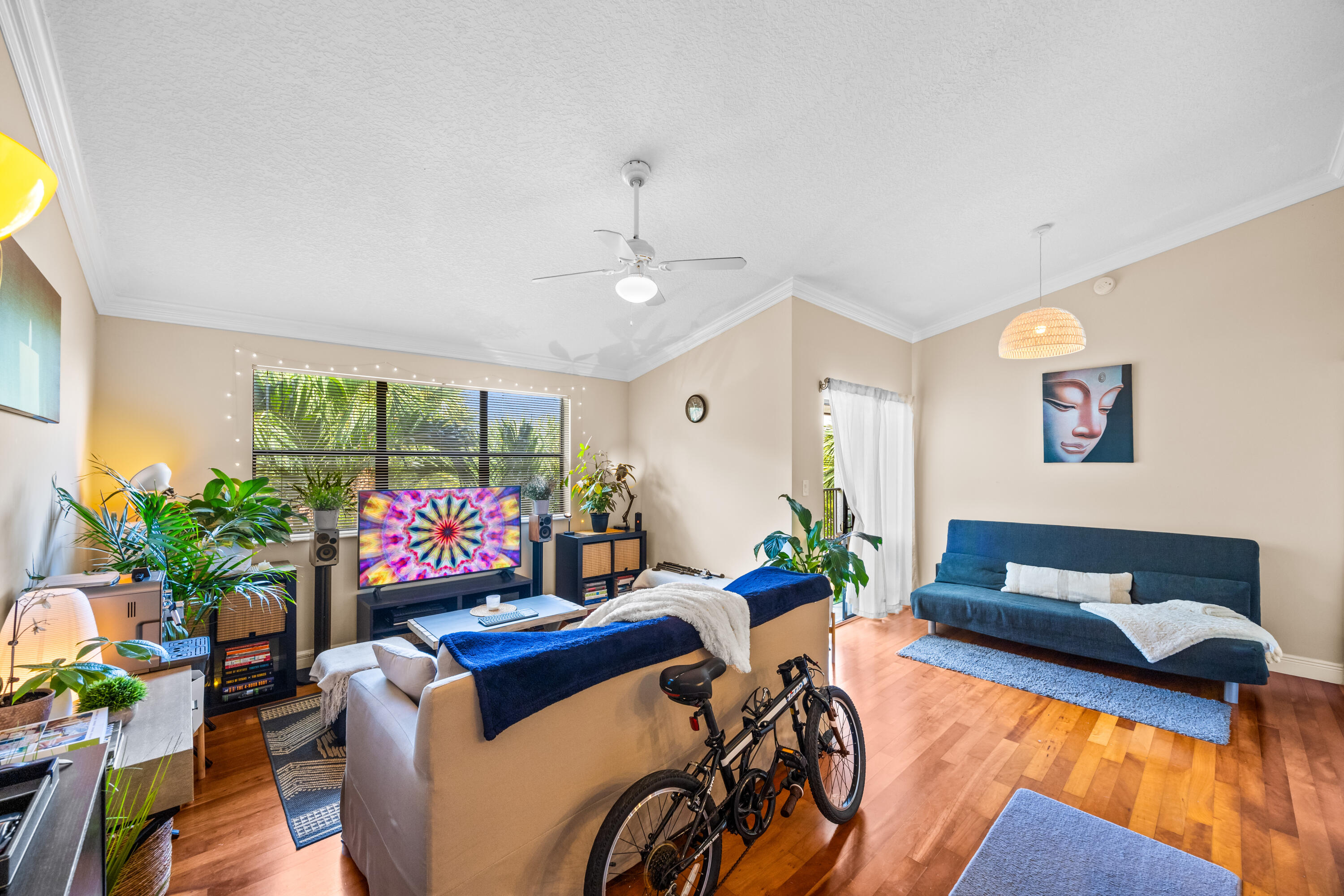 550 South Park Road, Unit 318 Hollywood, FL 33021 - Photo 3 of 27 a living room with furniture fireplace and flowers