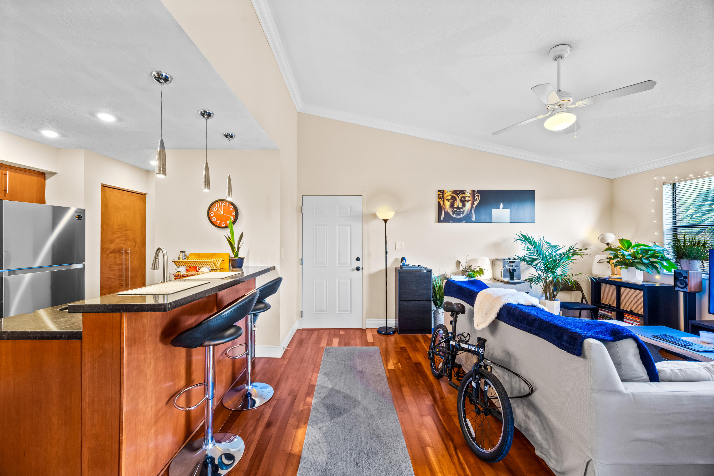 550 South Park Road, Unit 318 Hollywood, FL 33021 - Photo 4 of 27 a view of a dining room with furniture and a chandelier