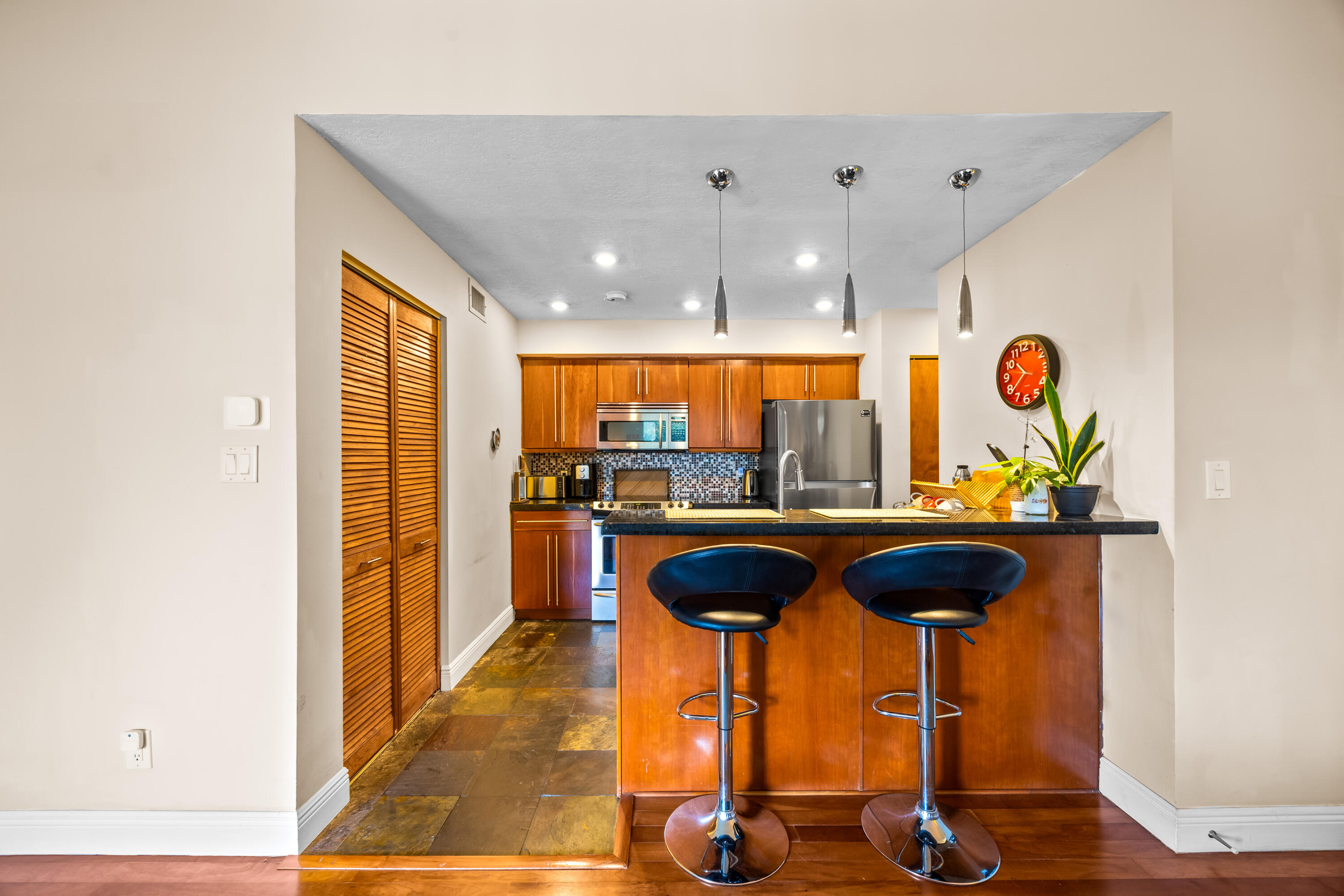 550 South Park Road, Unit 318 Hollywood, FL 33021 - Photo 7 of 27 a view of entryway with furniture and chandelier