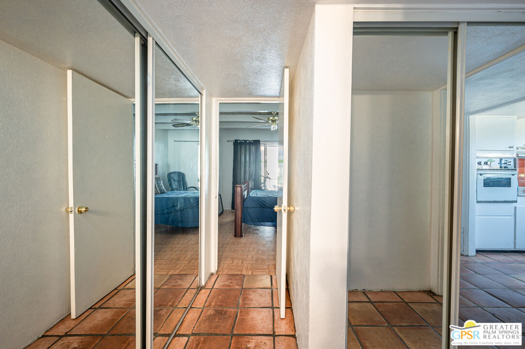 39910 Bird Lane Rancho Mirage, CA 92270 - Photo 12 of 45 a view of a bathroom from the hallway
