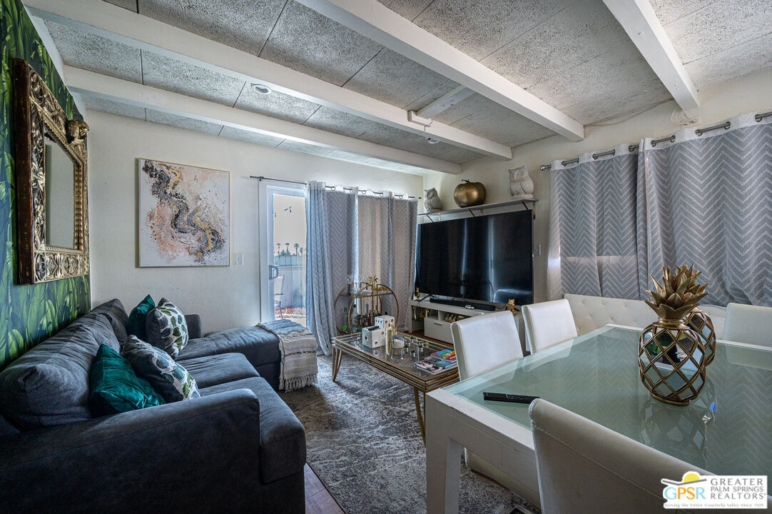 39910 Bird Lane Rancho Mirage, CA 92270 - Photo 21 of 45 a living room with furniture and a flat screen tv