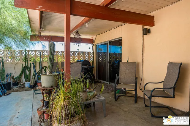 a view of outdoor space with chairs