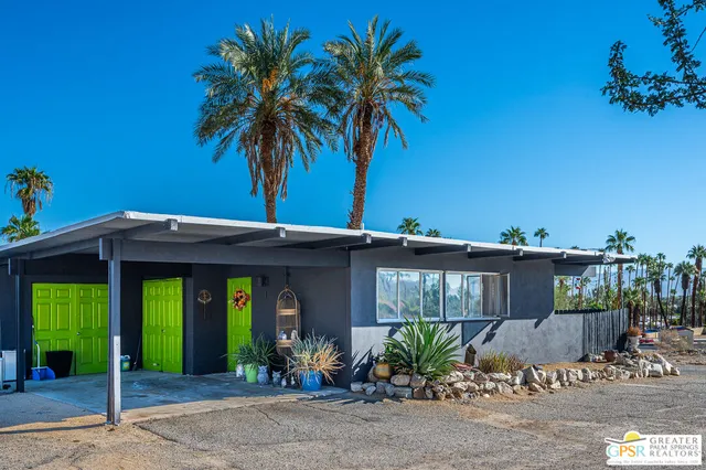a front view of a house with a porch