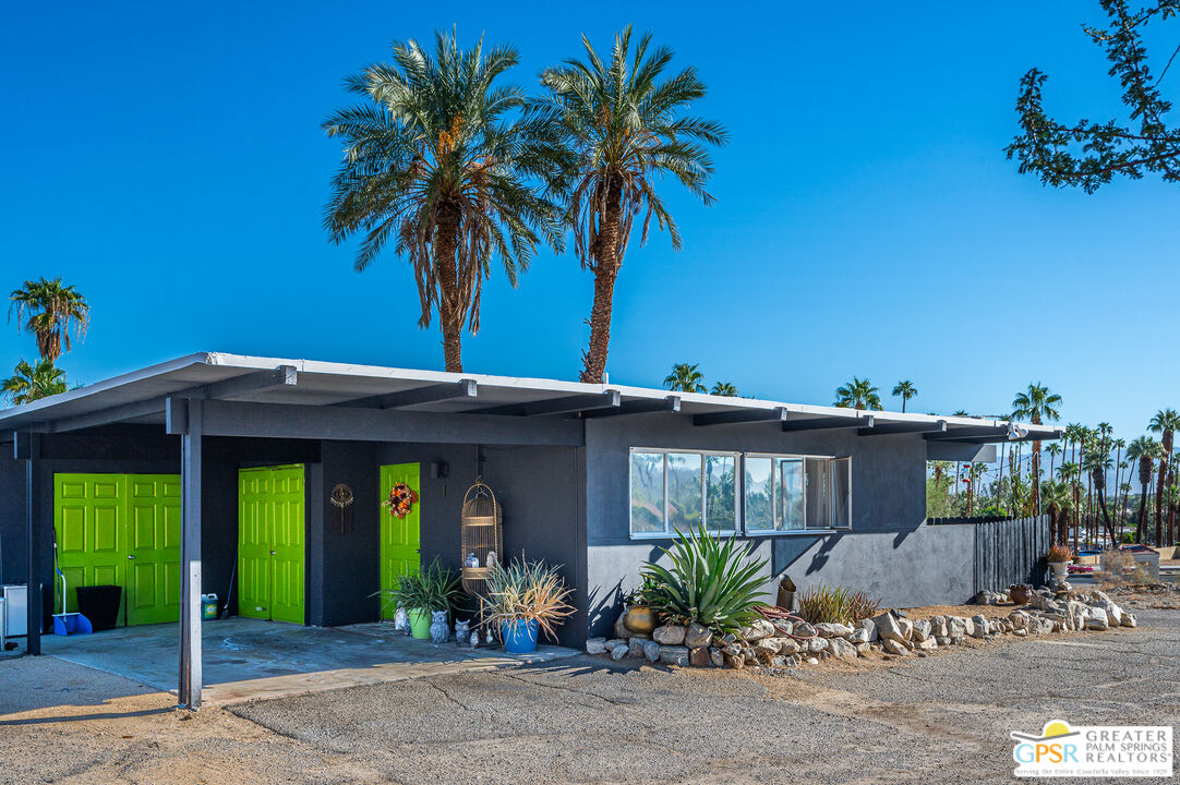 39910 Bird Lane Rancho Mirage, CA 92270 - Photo 43 of 45 a front view of a house with a porch