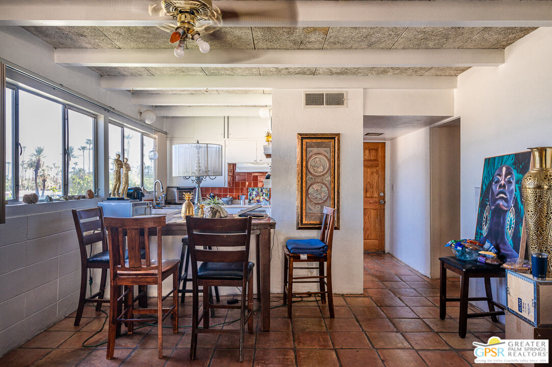 39910 Bird Lane Rancho Mirage, CA 92270 - Photo 9 of 45 a view of a dining room with furniture and window