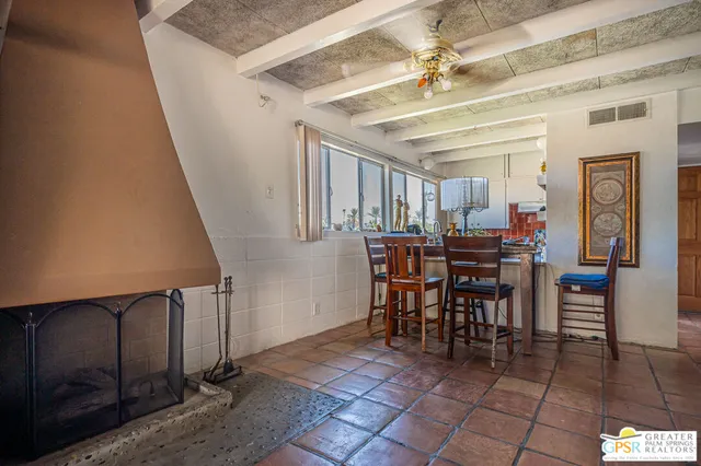 a view of a livingroom with furniture and window