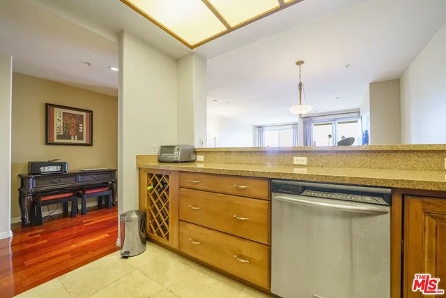 a kitchen with a stove and a cabinets