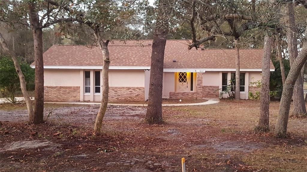 266 Main Road Lake Mary, FL 32746 - Photo 1 of 1 a view of a road with a tree