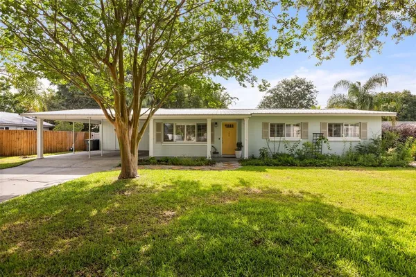 front view of a house with a yard