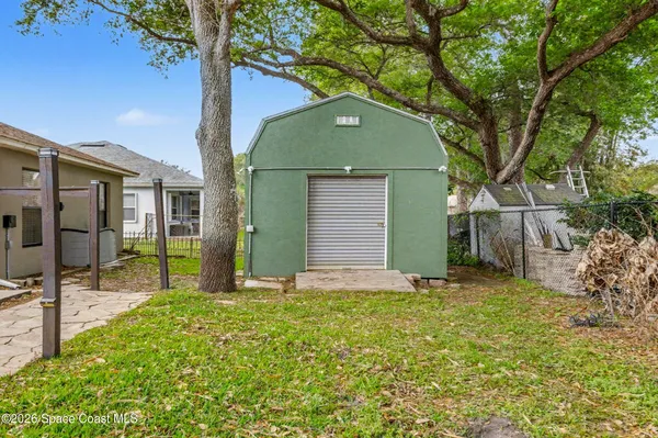 a house view with a outdoor space