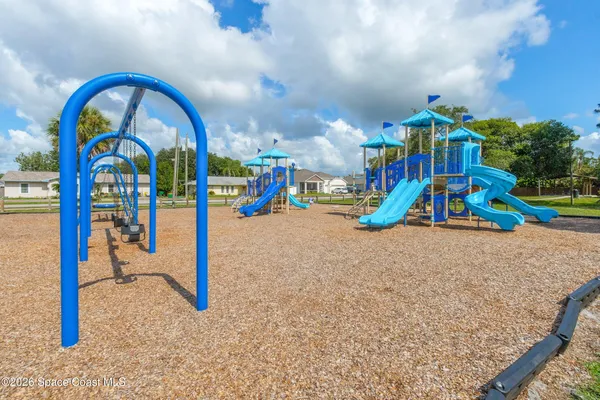 a view of outdoor space with playground and entertaining space
