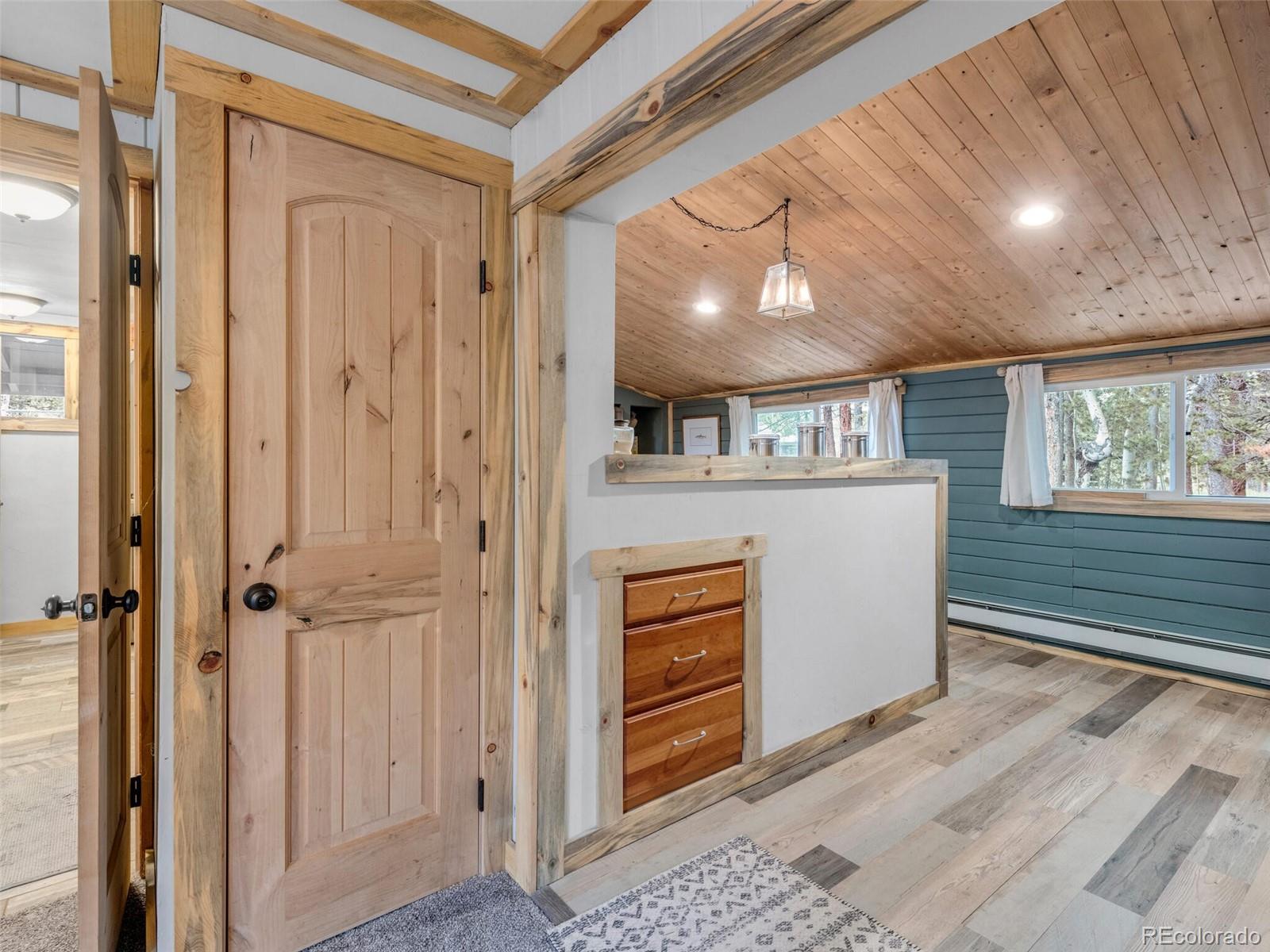 146 Dynamite Drive Black Hawk, CO 80422 - Photo 13 of 26 a view of a hallway with workspace and a window
