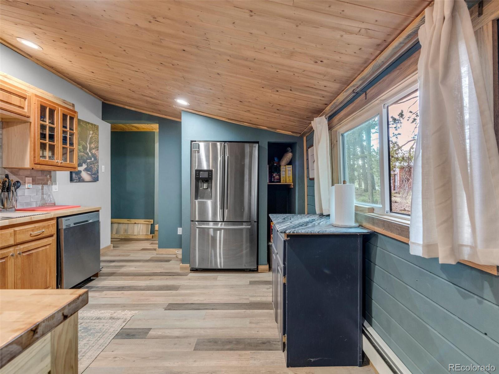 146 Dynamite Drive Black Hawk, CO 80422 - Photo 14 of 26 a kitchen with stainless steel appliances granite countertop a refrigerator and a stove