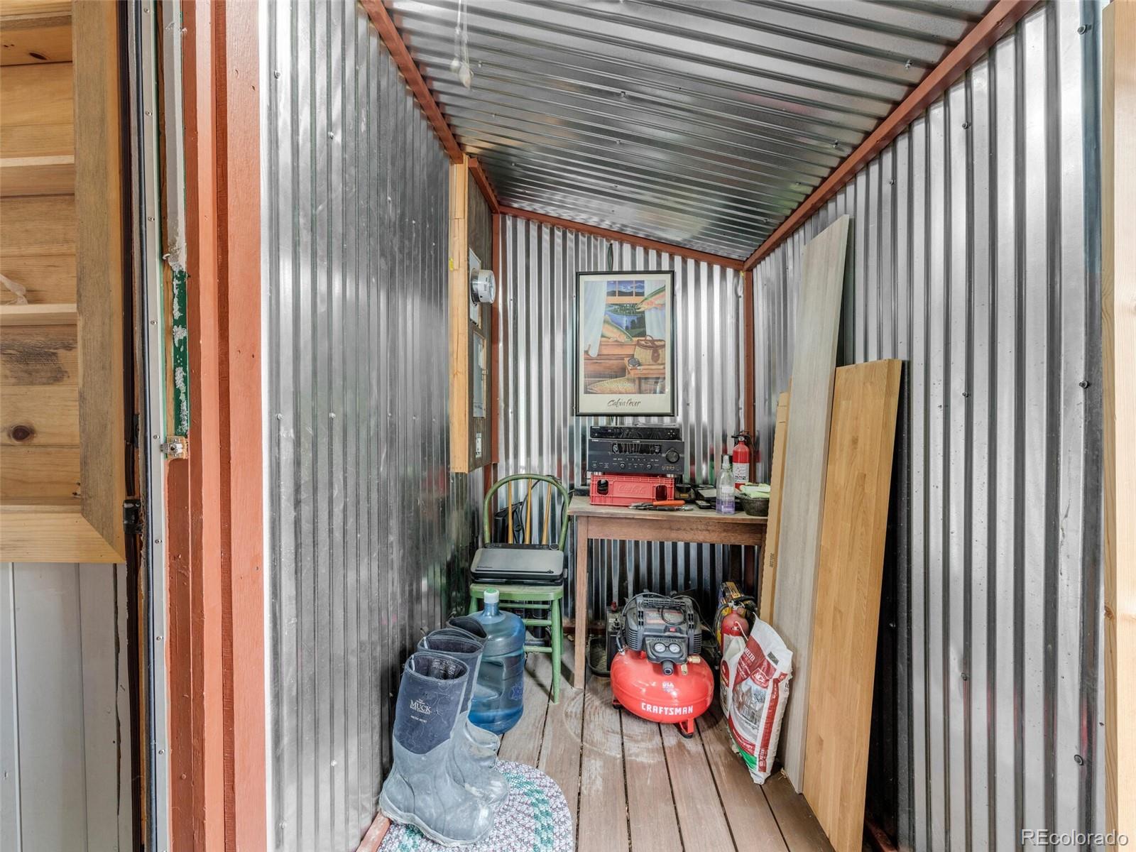 146 Dynamite Drive Black Hawk, CO 80422 - Photo 4 of 26 a room with furniture and rug