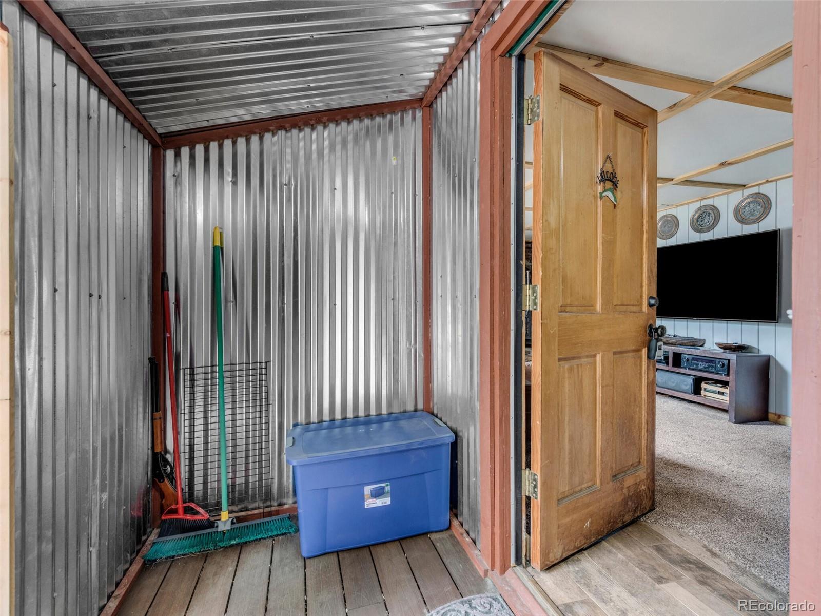 146 Dynamite Drive Black Hawk, CO 80422 - Photo 5 of 26 a view of a livingroom with furniture and front door