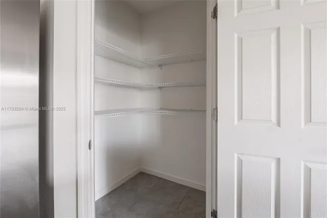 a empty closet with white paint
