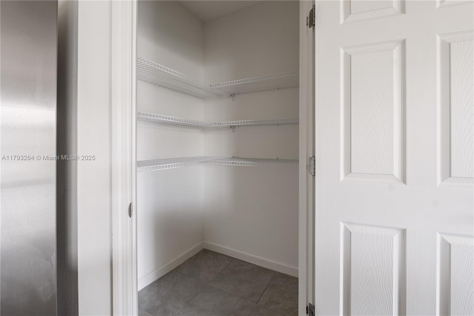 5305 Fantasy Drive Fort Pierce, FL 34947 - Photo 6 of 14 a empty closet with white paint