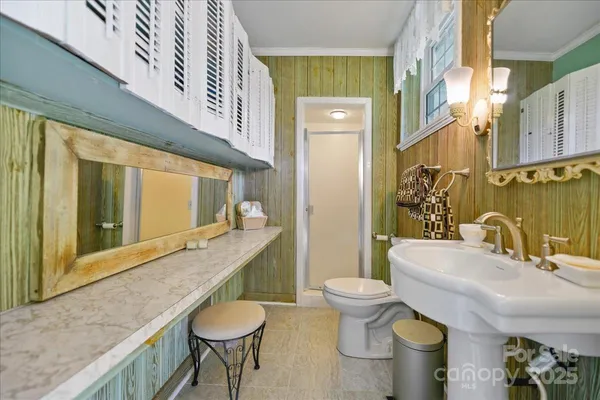 a backyard of a house with yard and outdoor seating