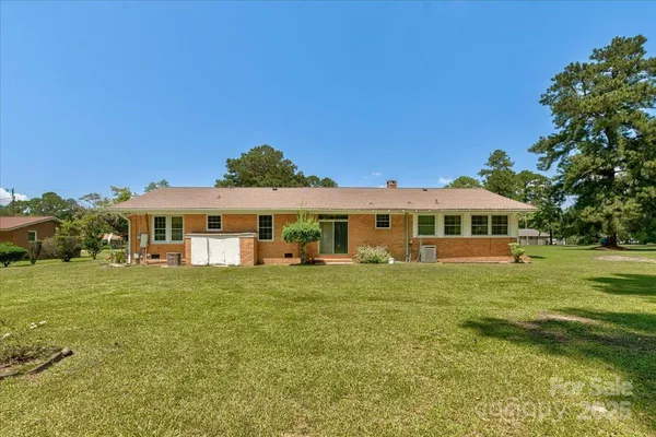 a view of a house with a big yard