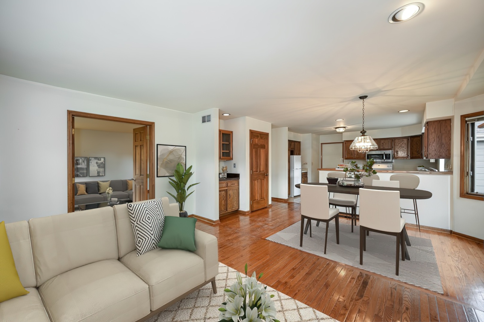 520 Renn Court Wheaton, IL 60187 - Photo 15 of 33 a living room with furniture dining area and a wooden floor