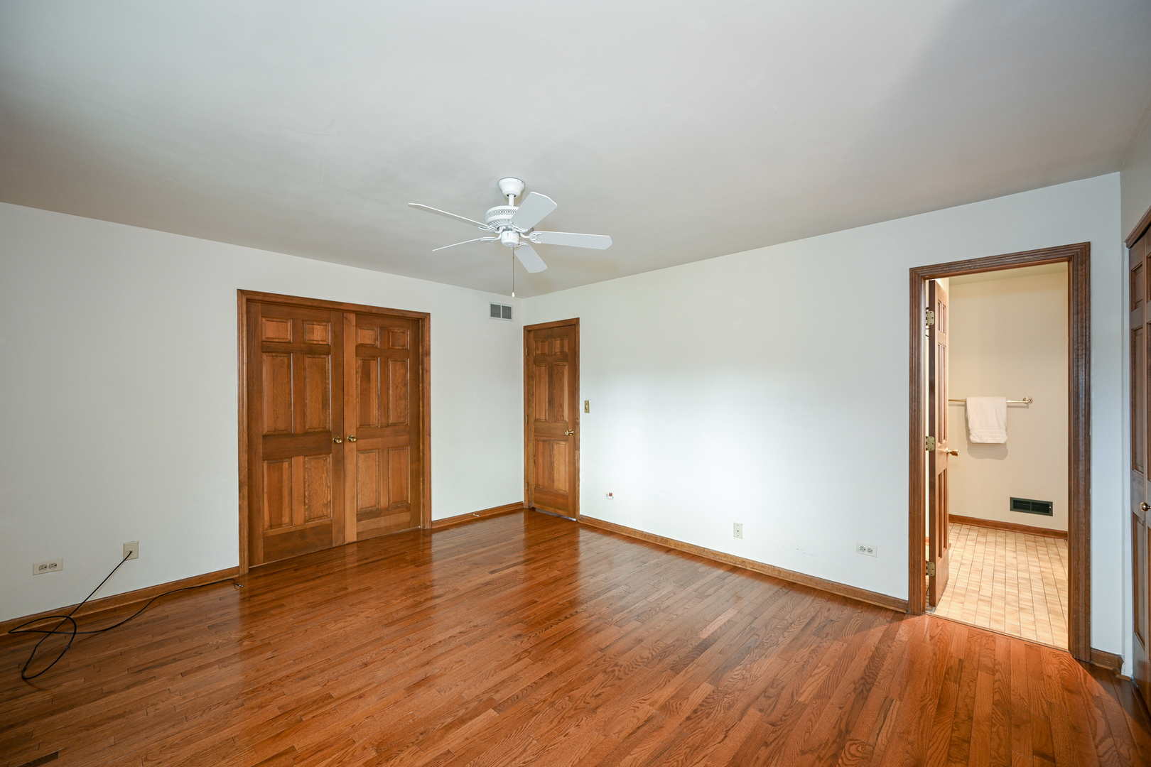 520 Renn Court Wheaton, IL 60187 - Photo 22 of 33 wooden floor in an empty room with a window