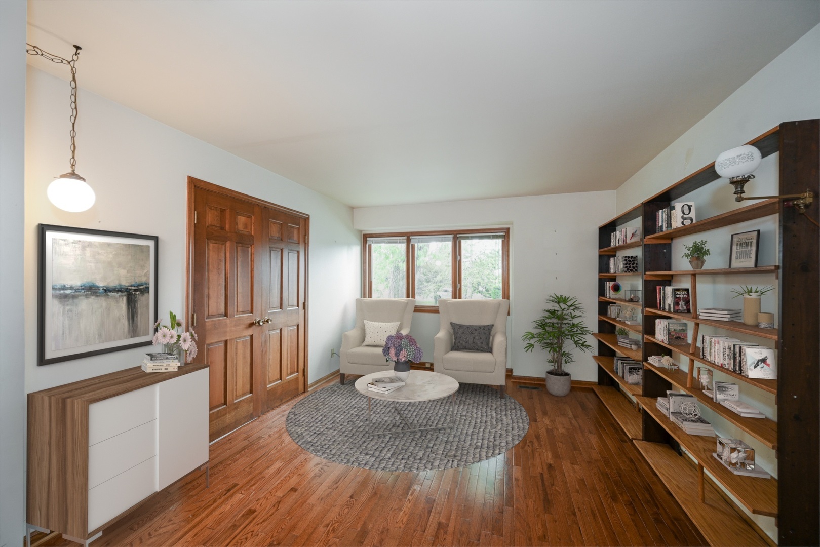 520 Renn Court Wheaton, IL 60187 - Photo 27 of 33 a living room with furniture and a wooden floor