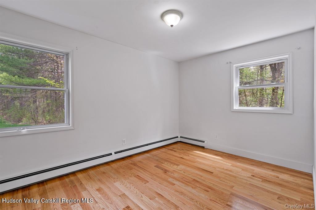 2 Mountain Valley Road Boiceville, NY 12412 - Photo 14 of 42 a view of empty room with wooden floor and fan