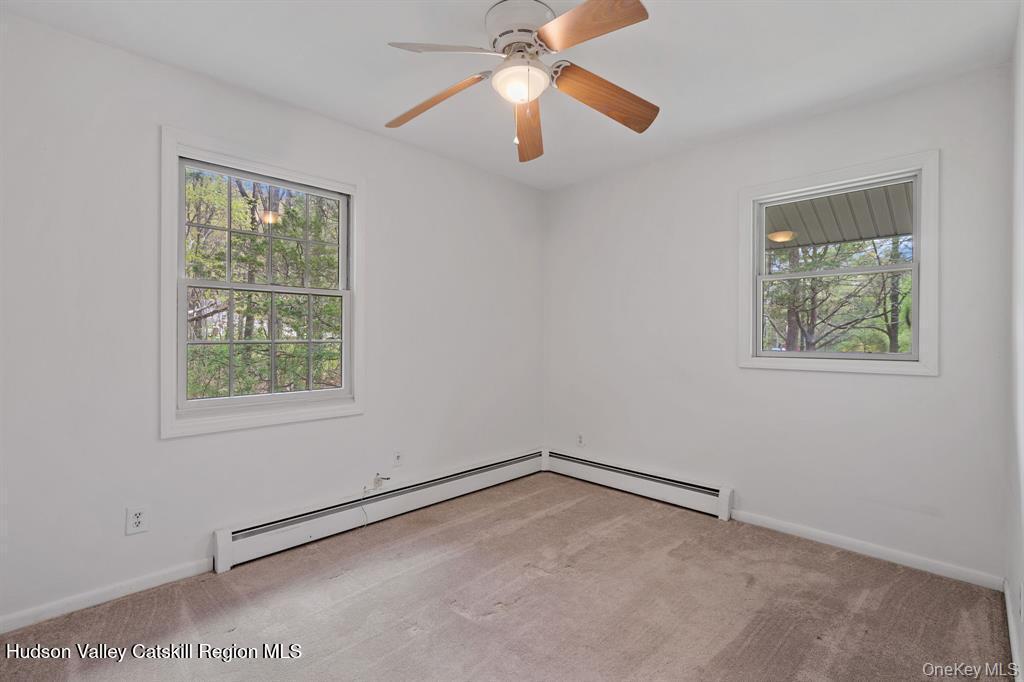 2 Mountain Valley Road Boiceville, NY 12412 - Photo 33 of 42 wooden floor in an empty room with a window