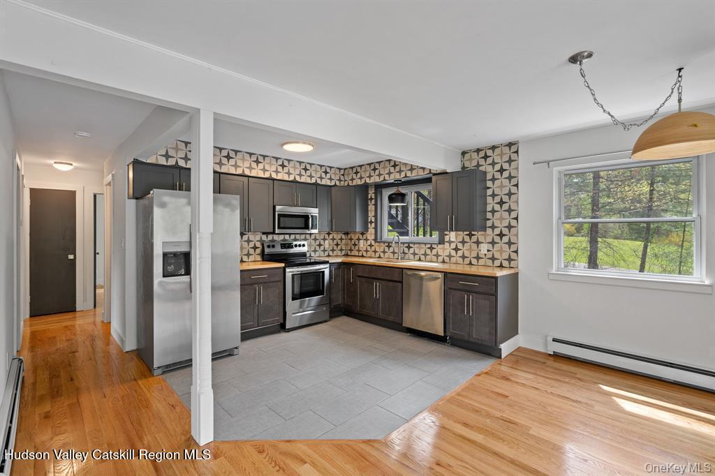 2 Mountain Valley Road Boiceville, NY 12412 - Photo 4 of 42 a kitchen with a refrigerator and a sink