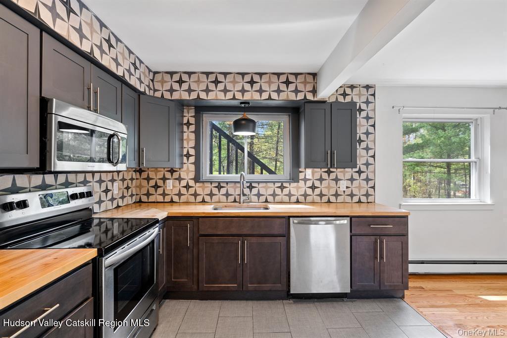2 Mountain Valley Road Boiceville, NY 12412 - Photo 6 of 42 a kitchen with a sink and stove