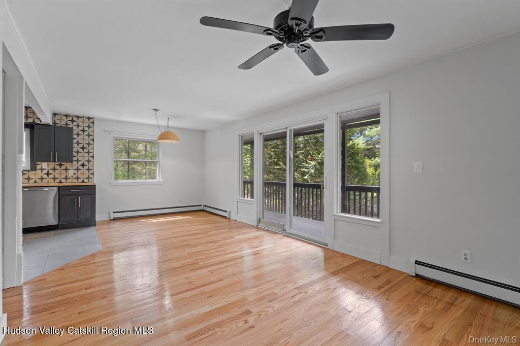 2 Mountain Valley Road Boiceville, NY 12412 - Photo 9 of 42 a view of an empty room with a window and a kitchen