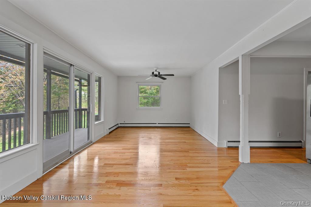 2 Mountain Valley Road Boiceville, NY 12412 - Photo 10 of 42 wooden floor in an empty room with a window