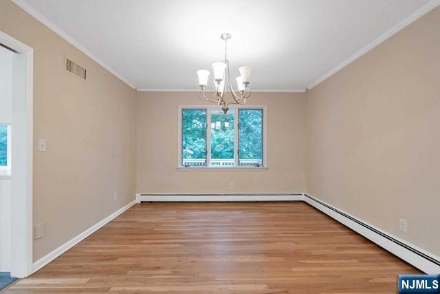 32 Rock Road Englewood Cliffs, NJ 07632 - Photo 9 of 30 wooden floor in an empty room with a window