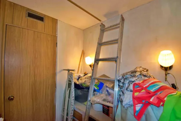 a bathroom with a shower and a sink