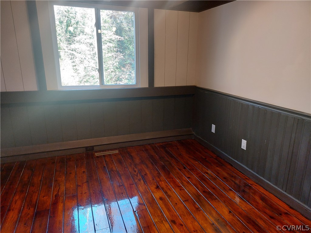 3717 Pfost Avenue Prince George, VA 23875 - Photo 33 of 39 a empty room with wooden floor and windows