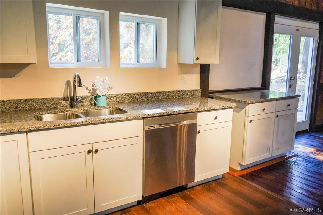 3717 Pfost Avenue Prince George, VA 23875 - Photo 7 of 39 a kitchen with granite countertop white cabinets and white appliances