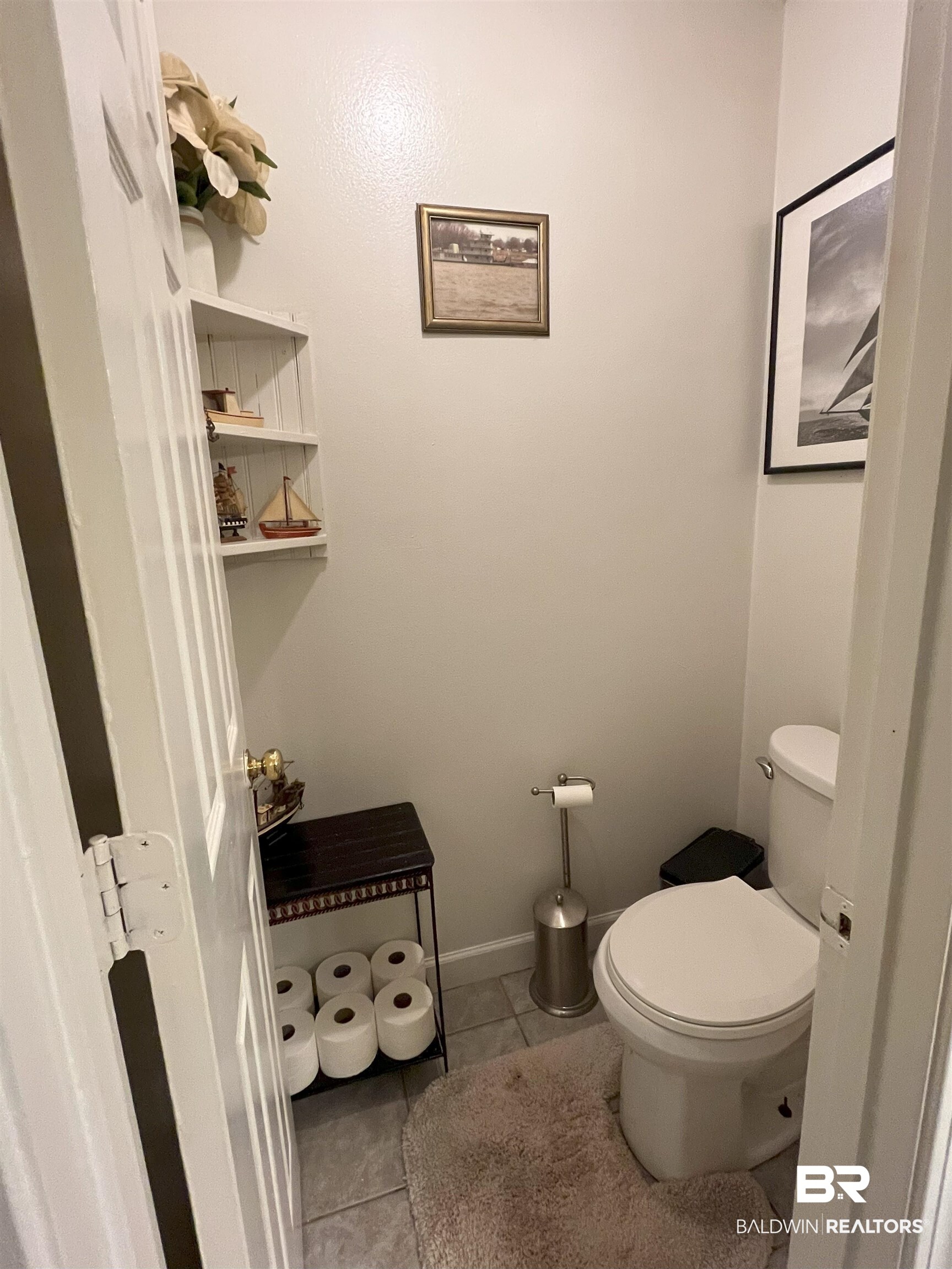 7851 Highway 98 Fairhope, AL 36532 - Photo 25 of 40 Bathroom with light tile patterned floors and toilet separate