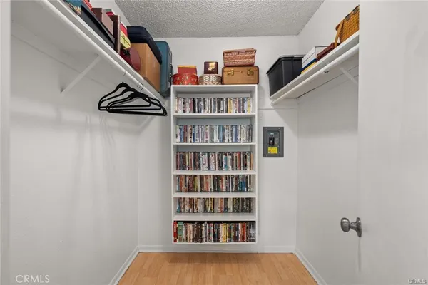 a view of an empty room with shelves