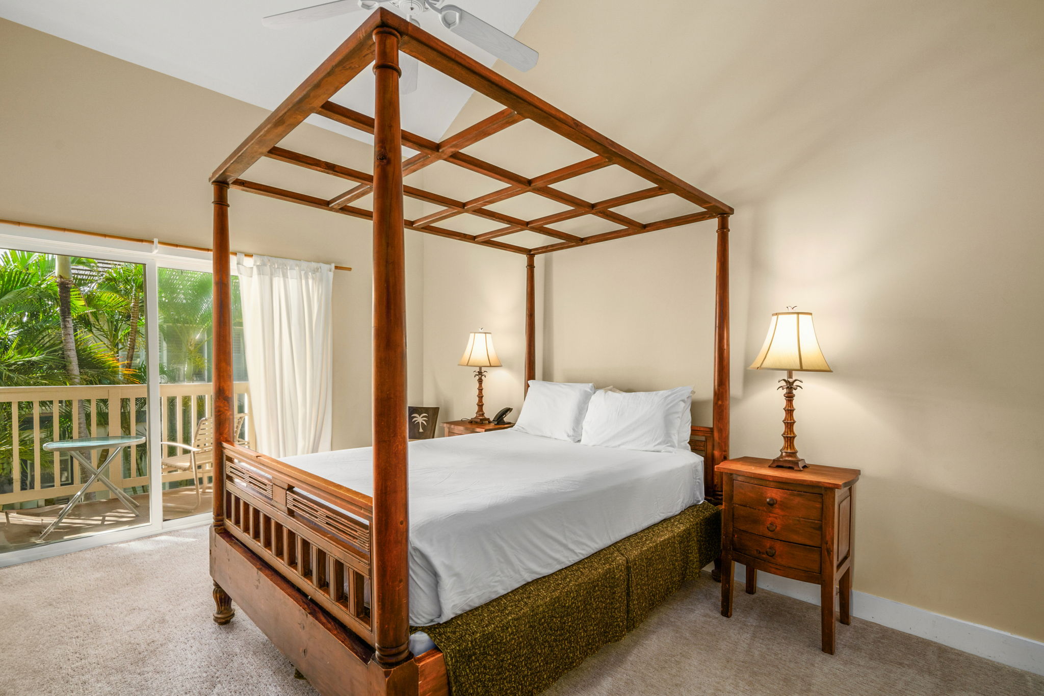 1831 Poipu Road, Unit 823 Koloa, HI 96756 - Photo 13 of 30 a bedroom with a bed and a window