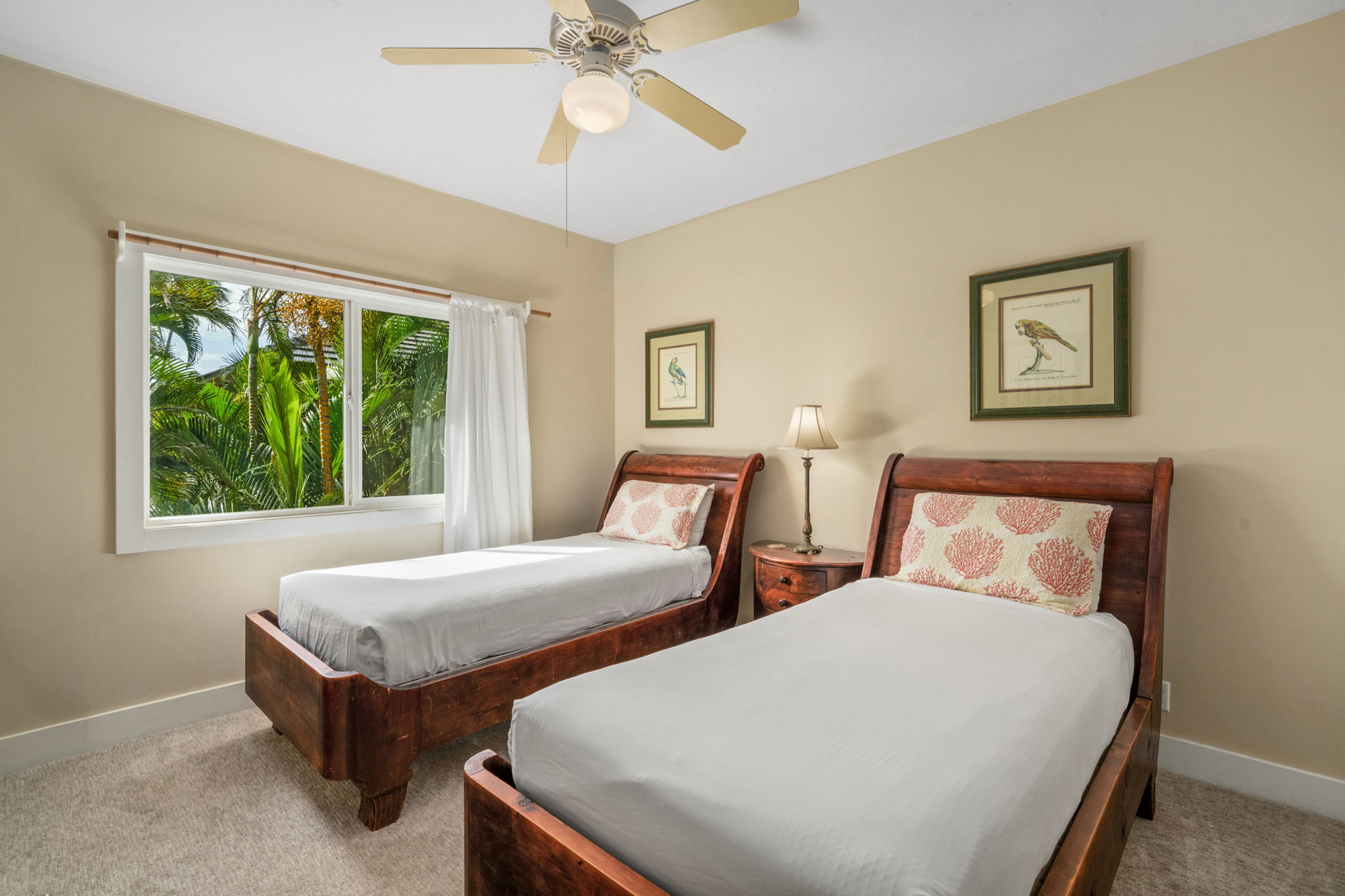 1831 Poipu Road, Unit 823 Koloa, HI 96756 - Photo 10 of 30 a bedroom with two beds and windows