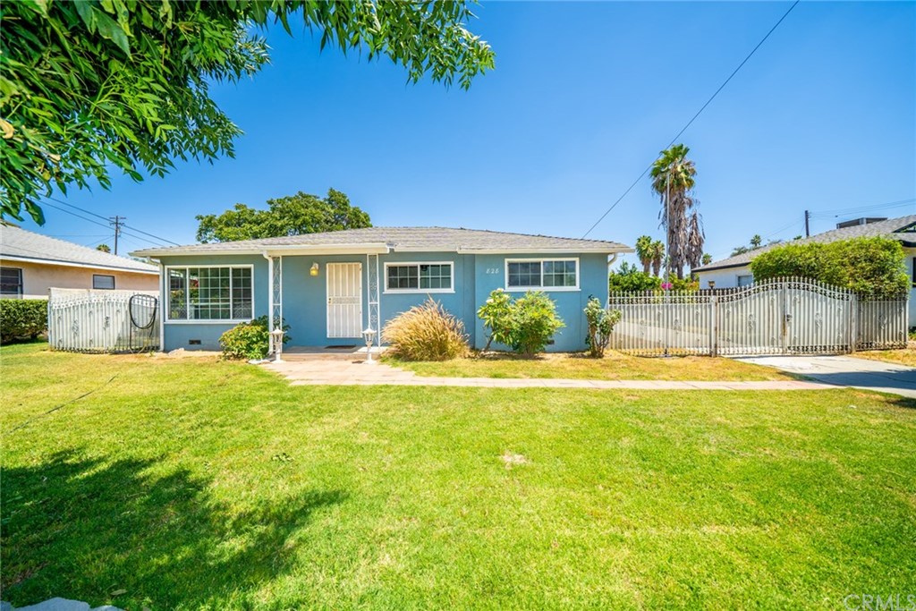 828 Orange Street Riverside, CA 92501 - Photo 1 of 1 a front view of house with yard and seating area