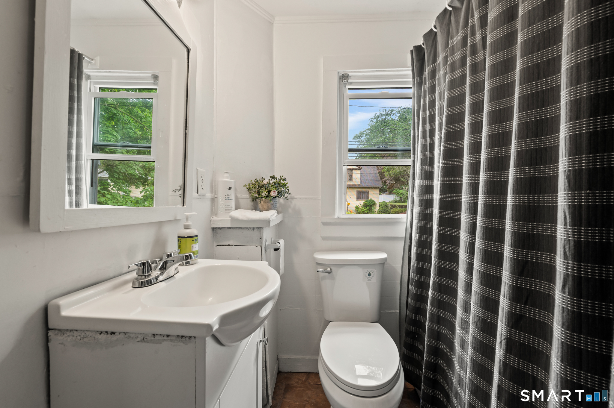 220 Murray Street Meriden, CT 06450 - Photo 17 of 28 a bathroom with a sink a toilet and shower