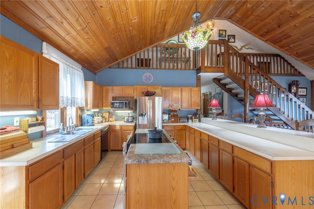 5001 Cartersville Road Powhatan, VA 23139 - Photo 8 of 30 Extensive cabinetry, counter space, and island!