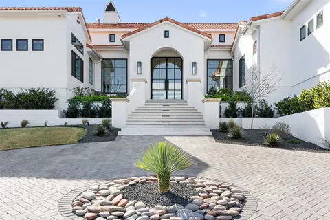 a view of a house with a garden