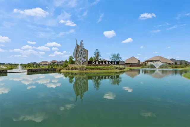 a view of a lake with houses with outdoor space