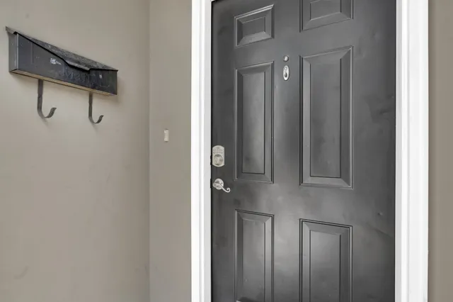 a view of a hallway with closet area
