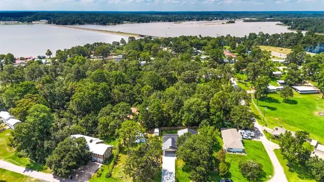 a view of lake with green space