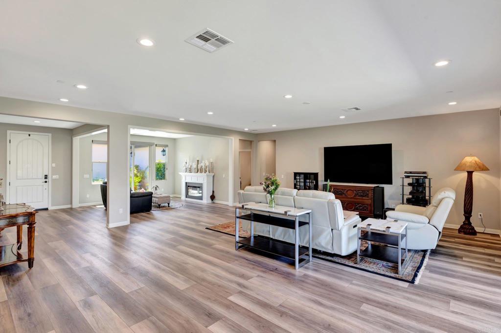 22005 Long Trot Drive Escondido, CA 92029 - Photo 15 of 51 a living room with furniture and a flat screen tv
