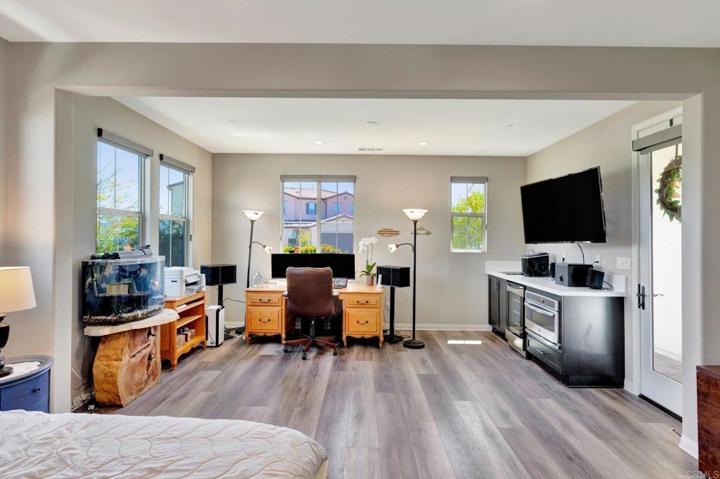 22005 Long Trot Drive Escondido, CA 92029 - Photo 26 of 51 a living room with furniture and a flat screen tv